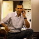Barack Obama talking on the phone on a plane in 2008 | Image: Getty